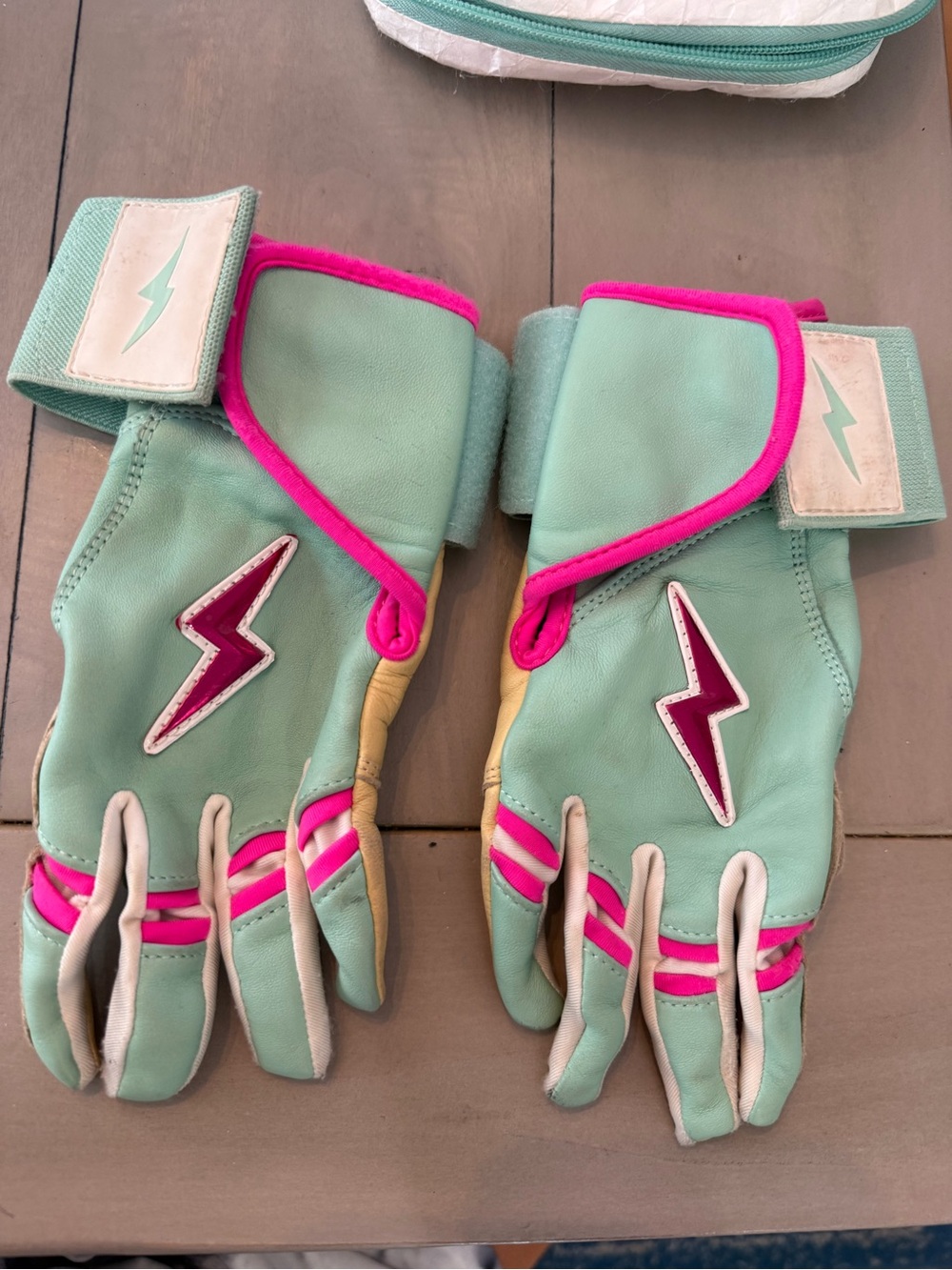 Bruce & Bolt Youth Mint Batting Gloves with Pink Accents